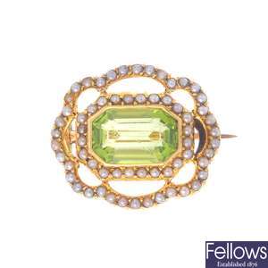 An early 20th century gold, peridot and split pearl brooch.