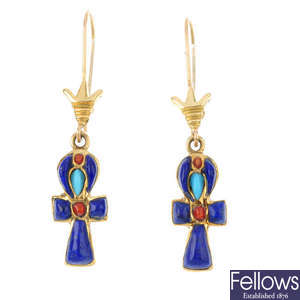 A pair of gem-set cross earrings.