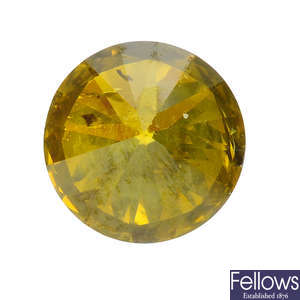 A brilliant-cut colour treated 'yellow' diamond, weighing 1.30cts.