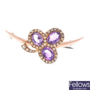 A late Victorian gold amethyst and split pearl brooch.