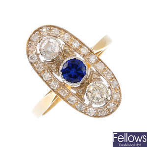 An 18ct gold diamond and synthetic sapphire dress ring.