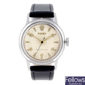 ROLEX - a mid-size stainless steel wrist watch.