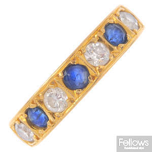 An 18ct gold diamond and sapphire seven-stone ring.