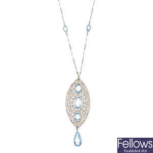 A diamond and aquamarine pendant, necklace and brooch.