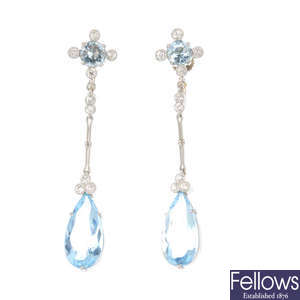 A pair of aquamarine and diamond earrings. 