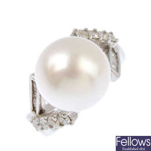 A diamond and cultured pearl ring.