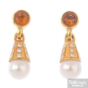 A pair of cultured pearl and gem-set earrings.