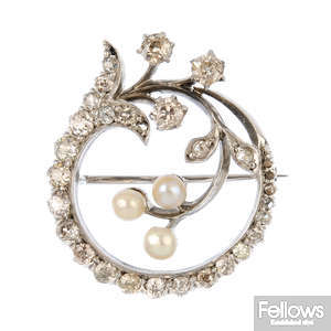 A diamond and seed pearl brooch.