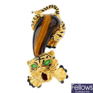 A tiger's-eye and enamel tiger brooch.