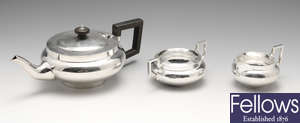 An Art Deco silver three-piece tea set.