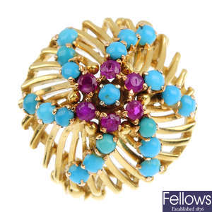A ruby and turquoise dress ring.