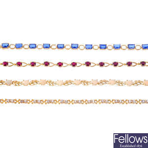 Four 9ct gold gem-set bracelets.