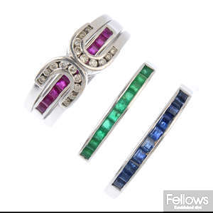 A set of four interchangeable gem-set rings.