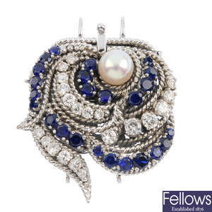 A diamond, sapphire and cultured pearl push-piece clasp