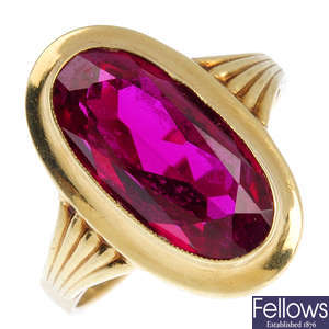 A synthetic ruby single-stone ring.