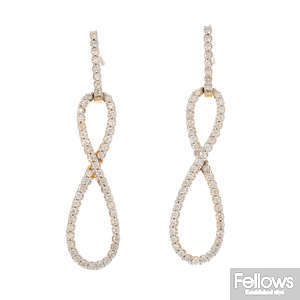A pair of 14ct gold diamond earrings.