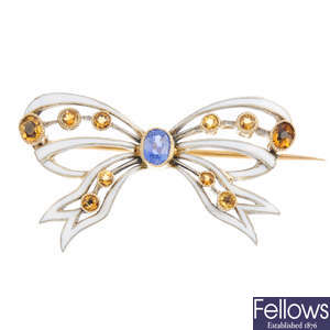 A late Victorian gold, enamel and gem-set bow brooch.