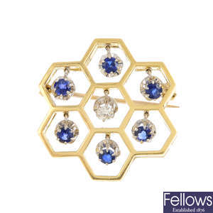 An 18ct gold sapphire and diamond brooch.