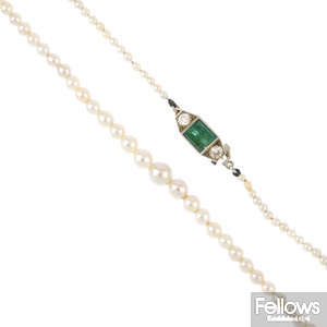 A cultured pearl single-strand necklace, with emerald and diamond clasp.
