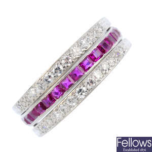 A ruby, sapphire and diamond eternity flip ring.