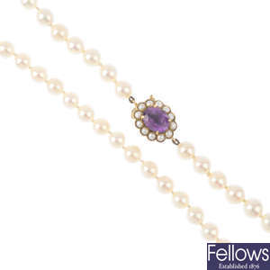 A cultured pearl single-strand necklace, with 9ct gold gem-set clasp.