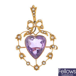 An early 20th century gold amethyst and split pearl pendant.