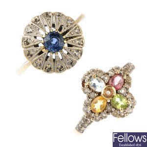 Four gold diamond and gem-set rings.