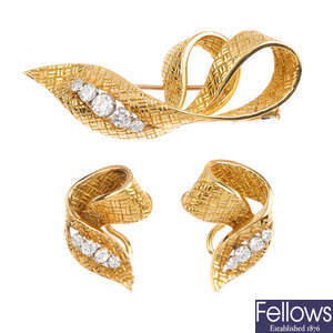 BOUCHERON - a 1960s diamond brooch, with associated 1960s 18ct gold diamond earrings.