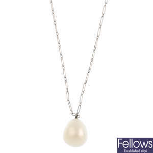 A natural pearl pendant, on chain.