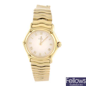 EBEL - a lady's 18ct yellow gold Classic Wave bracelet watch.
