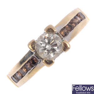 A diamond and 'brown' diamond ring.