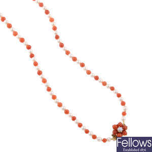 A coral and cultured pearl necklace.
