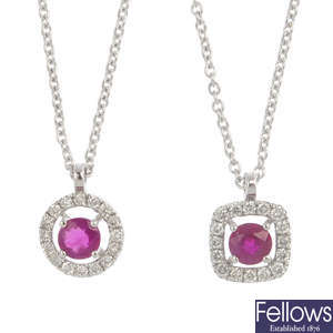 Two 9ct gold ruby and diamond pendants and a pair of ruby and diamond stud earrings.