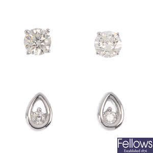 Two pairs of 18ct gold diamond single-stone ear studs.
