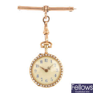 An early 20th century gold diamond, split pearl and enamel fob watch.