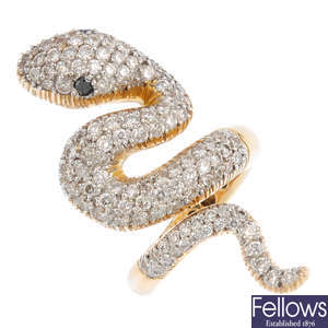A diamond and black-gem snake ring.