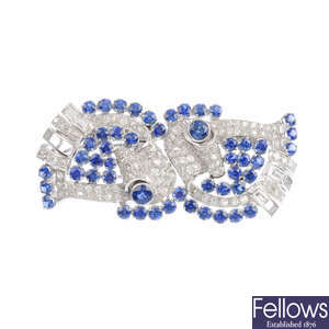 A sapphire and diamond double clip brooch.