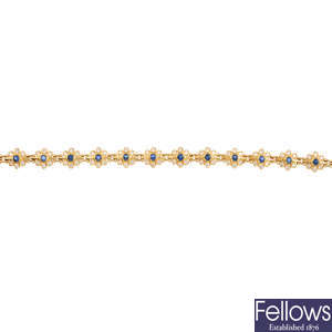 An 18ct gold sapphire and diamond floral cluster bracelet.