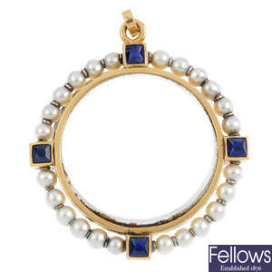 An early 20th century gold, sapphire and seed pearl photographic pendant.
