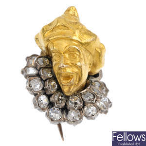 A mid to late Victorian gold, silver and diamond pierrot brooch.