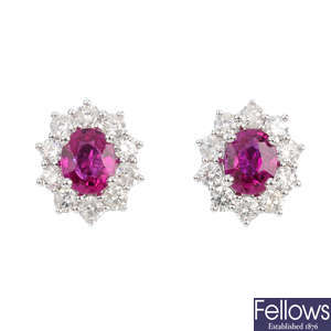 A pair of ruby and diamond cluster earrings. 
