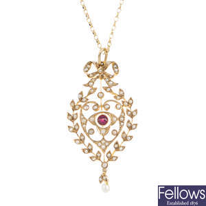 An Edwardian 9ct gold split pearl and garnet pendant, with later chain.