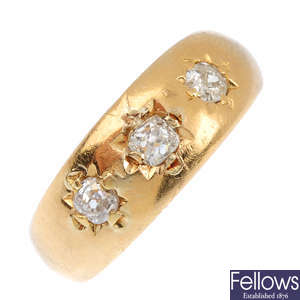 An Edwardian 18ct gold diamond three-stone ring.