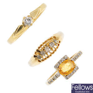 Three diamond and gem-set rings.