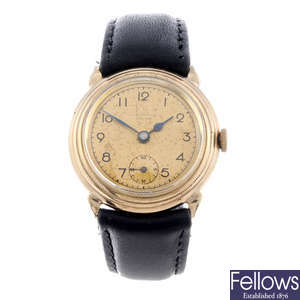 J.W BENSON - a gentleman's 9ct yellow gold wrist watch.