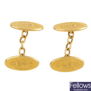 A pair of late Victorian 18ct gold cufflinks, engraved with crest and motto.