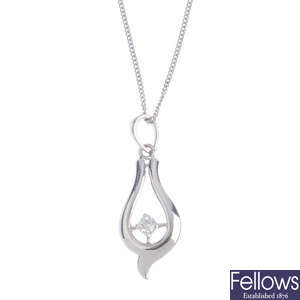 A diamond pendant with 18ct gold chain.