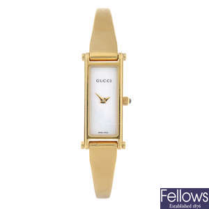 GUCCI - a lady's gold plated 1500L bracelet watch.