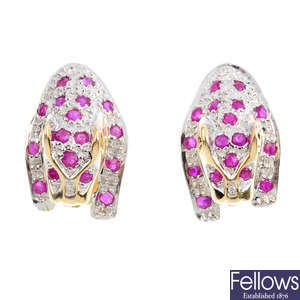 A pair of ruby leopard earrings.