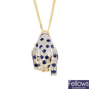 A sapphire and diamond leopard pendant, with 9ct gold chain.